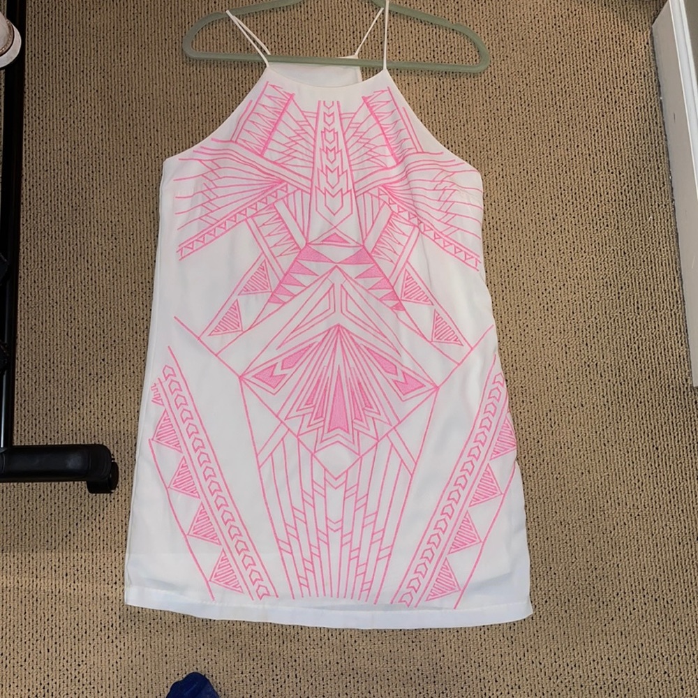 White dress with neon pink detailing